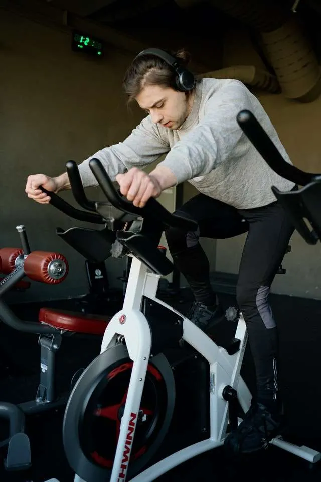 Man exercising on a spin bike