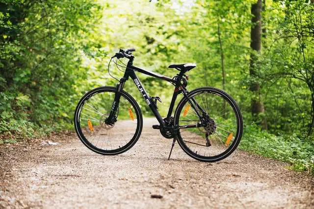 Black and white mountain bike on dirt path