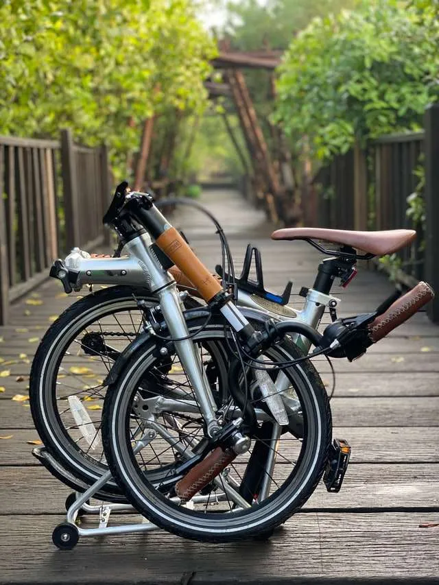 folding bicycle on wooden bridge