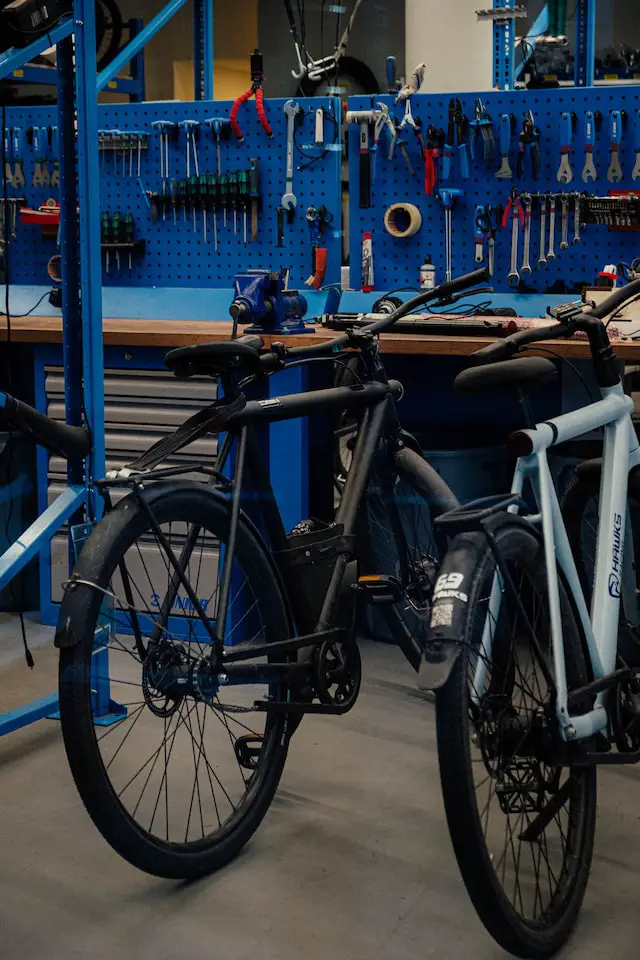 2 mountain bikes in bike repair shop
