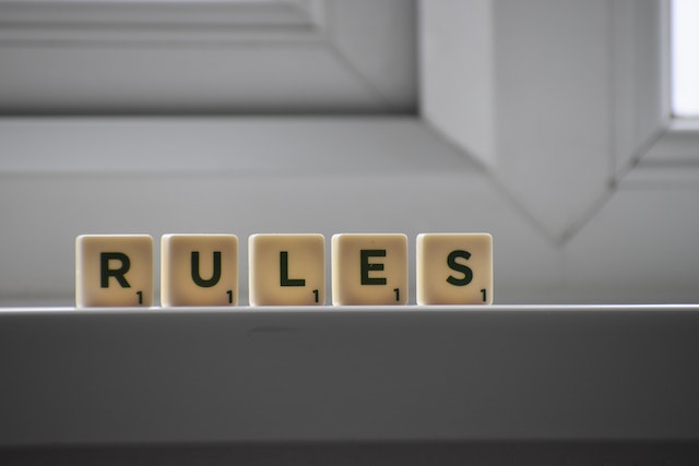 Rules sign created with scrabble chips