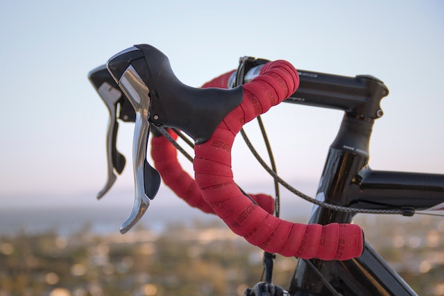 red and black road bike handlebars